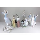 Ten Lladro porcelain figures including two girls with hats, two ballerinas on wooden bases, a