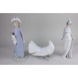 Three Lladro porcelain figures, a woman in 1920's ball gown, a child with a doll (a/f) and a dove