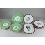 Two continental porcelain part dessert services, one with hand painted floral design within green