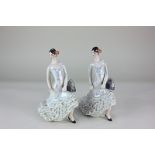 A pair of USSR porcelain figures of flamenco dancers, in pearlescent dresses 23cm high