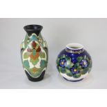 A Gouda pottery vase, of baluster form, with Art Nouveau style floral decoration on black and