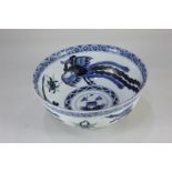 A Chinese porcelain blue and white bowl, decorated with a dragon and a hoho bird, character marks to