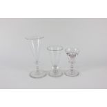 Three Georgian cordial and ale glasses, with knop stems and rough pontil marks, tallest 15.5cm