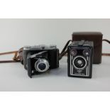 A Baldix Balda camera, together with an Agfa Synchro box camera, both in brown leather cases