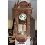 A Vienna wall dial, the carved walnut case with female mask head arch, (a/f) 80cm high