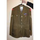 A Coldstream guards No. 2 Army dress uniform jacket, with badges of sergeant rank, the label stating