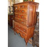 A Queen Anne style mahogany chest on stand, the top chest of two small over three long graduated