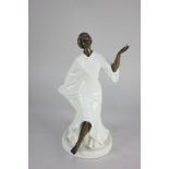 A Minton porcelain and bronze figure of a Grecian dancer, 26cm high