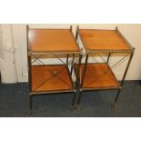 A pair of gilt metal mounted two-tier side tables with square tops and undershelf, on brass supports