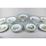 A 19th century porcelain part dessert service, decorated with scenic views within a decorative