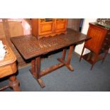 An Arts and Crafts oak rectangular side table, by repute from the Houses of Parliament, with lattice