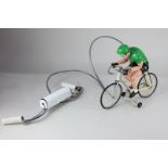 A Rima toy model of a jointed cyclist, 26cm high (a/f)