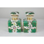 A pair of 19th century porcelain scent bottles, the hand painted floral design within green and gilt