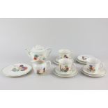 A mid-20th century Biltons, England porcelain child's teaset, decorated with children playing,