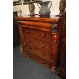 A Victorian, possibly Scottish, mahogany chest with acanthus carved frieze drawer above four further