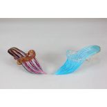 Two Venetian latticino glass models of shoes, in blue and pink, largest 17cm long