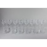 A set of eight Stuart crystal wine glasses, together with a set of six Webb Corbett cut glass