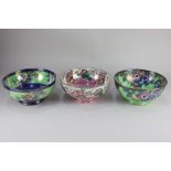 Three various Maling lustre ware bowls, decorated with blossom, anemones, and primroses, largest