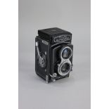 A Minolta Autocord Twin Lens Reflex medium format film camera with a 75mm Chiyoko Rokkor Lens