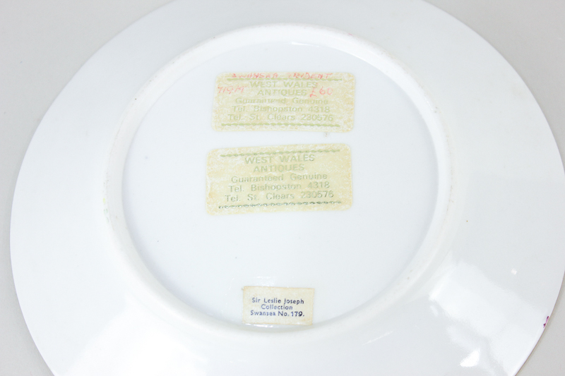 A Swansea porcelain plate, hand painted with floral sprays, 20cm diameter, label to base 'Sir Leslie - Image 2 of 2