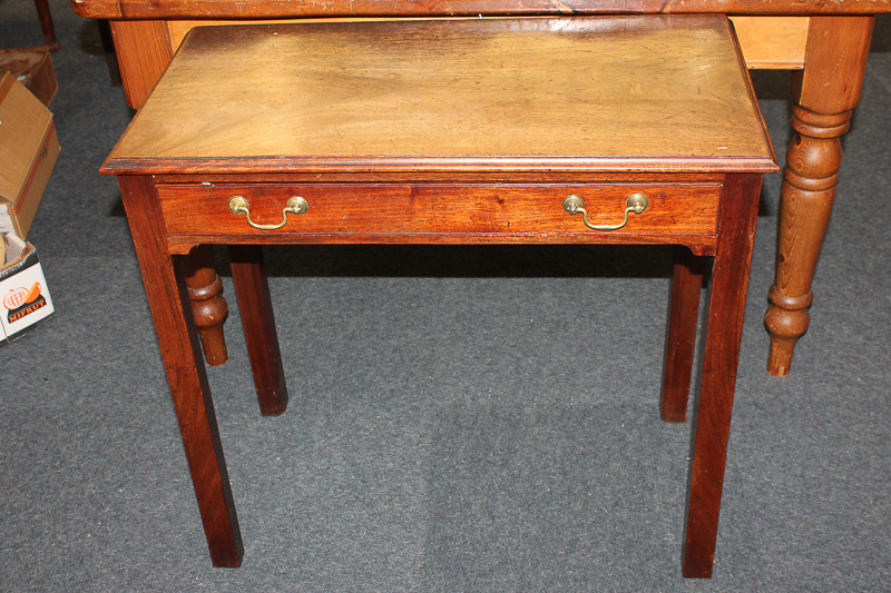 A George III mahogany rectangular side table, single drawer with brass swan neck handles, on