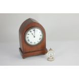 A gilt metal and mother of pearl miniature travel clock, the dial marked Fleur De Lys De Paris, 6.