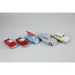 A collection of five Tri-ang Spot-On die-cast model motor cars, comprising a Morris 1100 with kayak,