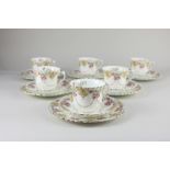 A Victorian Aynsley porcelain part tea set for six, of scalloped form with floral decoration,