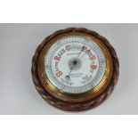 A Victorian aneroid barometer, the dial marked Webster Bros 4 Porchester Road Bayswater, in circular