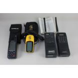 Two of Realistic walkie talkies, a Pro-41 with 10 channels and instruction manual and a Pro-28