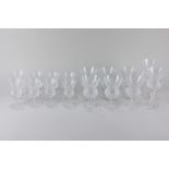 A collection of sixteen Edinburgh crystal etched glasses, of thistle form, comprising six white