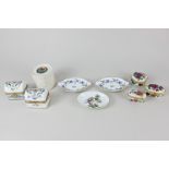 A small Herend porcelain dish decorated with birds, a pair of Herend porcelain ashtrays, a pair of