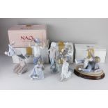 Two Lladro porcelain figures, a man with a water skin and a stork carrying a baby (a/f) and five Nao