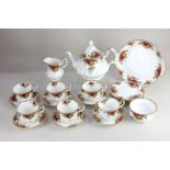A Royal Albert Old Country Roses porcelain tea set for six, comprising tea pot, milk jug, sugar