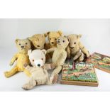 A Pipaluk polar bear cub sheepskin pajama case, five jointed teddy bears, one with growler, a