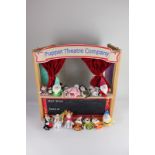 An ELC puppet theatre, with finger puppets and story cards for Cinderella and Snow White