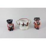 An Ashworth Brothers Hanley porcelain two handled cup decorated with scenes of a cock fight,