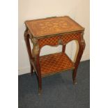 A Louis XVI style gilt metal mounted side table with floral decorated top, lattice design sides