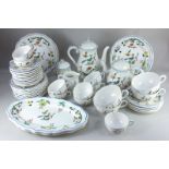 A Gien O'Seaux De Paradis part tea service, comprising a teapot, hot water pot, sugar bowl and