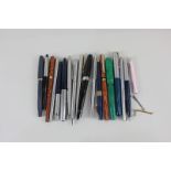 A small collection of fountain and ballpoint pens, to include Parker and Sheaffer's