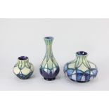 Three Moorcroft pottery Indigo pattern vases, in original boxes, tallest 16cm high