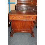 A Victorian rectangular desk with inset leather top and rising back section enclosing pigeon