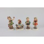 Four Hummel porcelain figures of children in various pursuits, 13cm