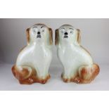 A pair of Sadler, Burslem pottery fireside dogs, 36cm high