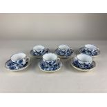 A set of six Meissen porcelain 'onion' pattern blue and white coffee cups and saucers, with floral