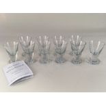 A set of ten Swedish glass liqueur glasses, on faceted feet, 8cm high (a/f)