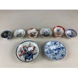 A Chinese porcelain small blue and white dish decorated with a figure on horseback before a