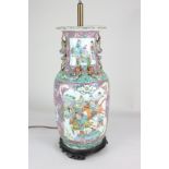 A Chinese porcelain baluster vase converted to a table lamp, decorated with panels of figures