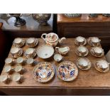 A porcelain 'tobacco leaf' part tea and coffee set, probably Chamberlain's Worcester, most pieces