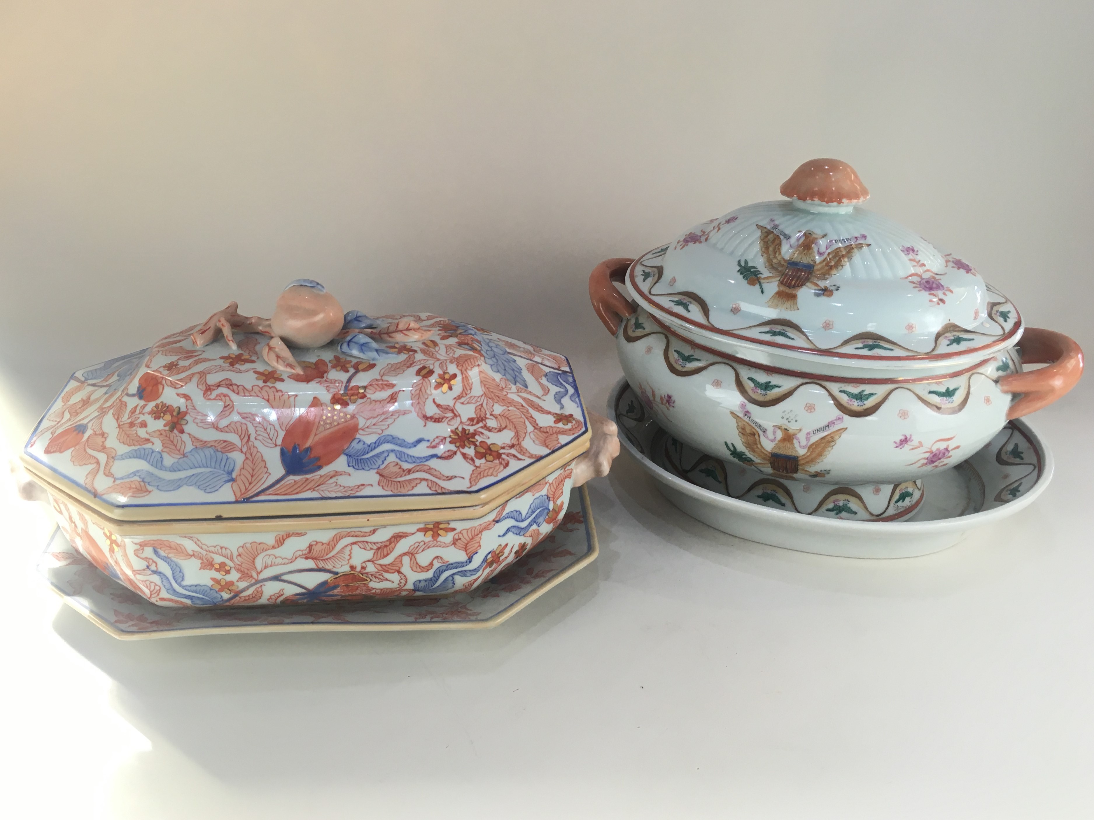 A Japanese porcelain tureen and cover, on stand, with floral decoration in the Imari palette, with